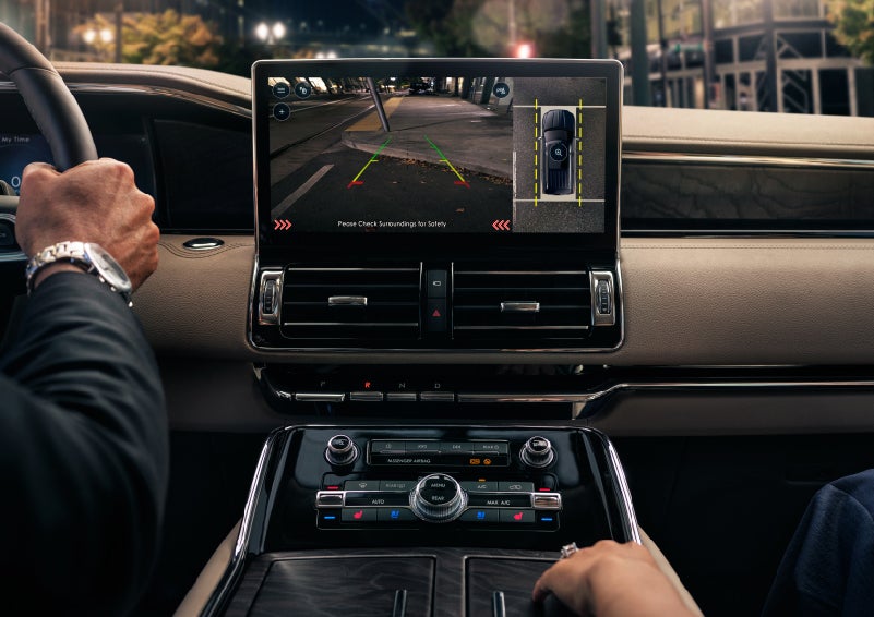 The 360-degree camera display on the center screen shows the rear and bird's eye view of the vehicle | Baldwin Lincoln in Covington LA