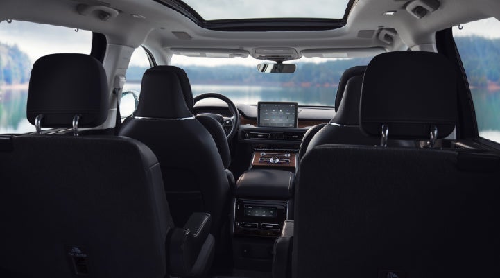 The interior of a 2024 Lincoln Aviator® SUV from behind the second row | Baldwin Lincoln in Covington LA