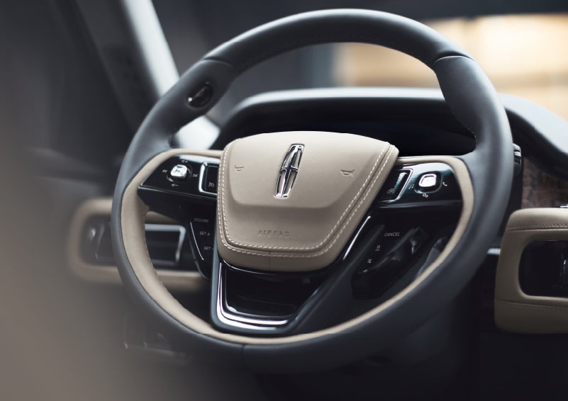 The intuitively placed controls of the steering wheel on a 2024 Lincoln Aviator® SUV | Baldwin Lincoln in Covington LA