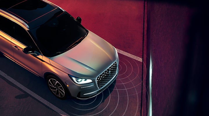 Illustrated radar signals are shown emitting from the front of a 2024 Lincoln Corsair® SUV. | Baldwin Lincoln in Covington LA